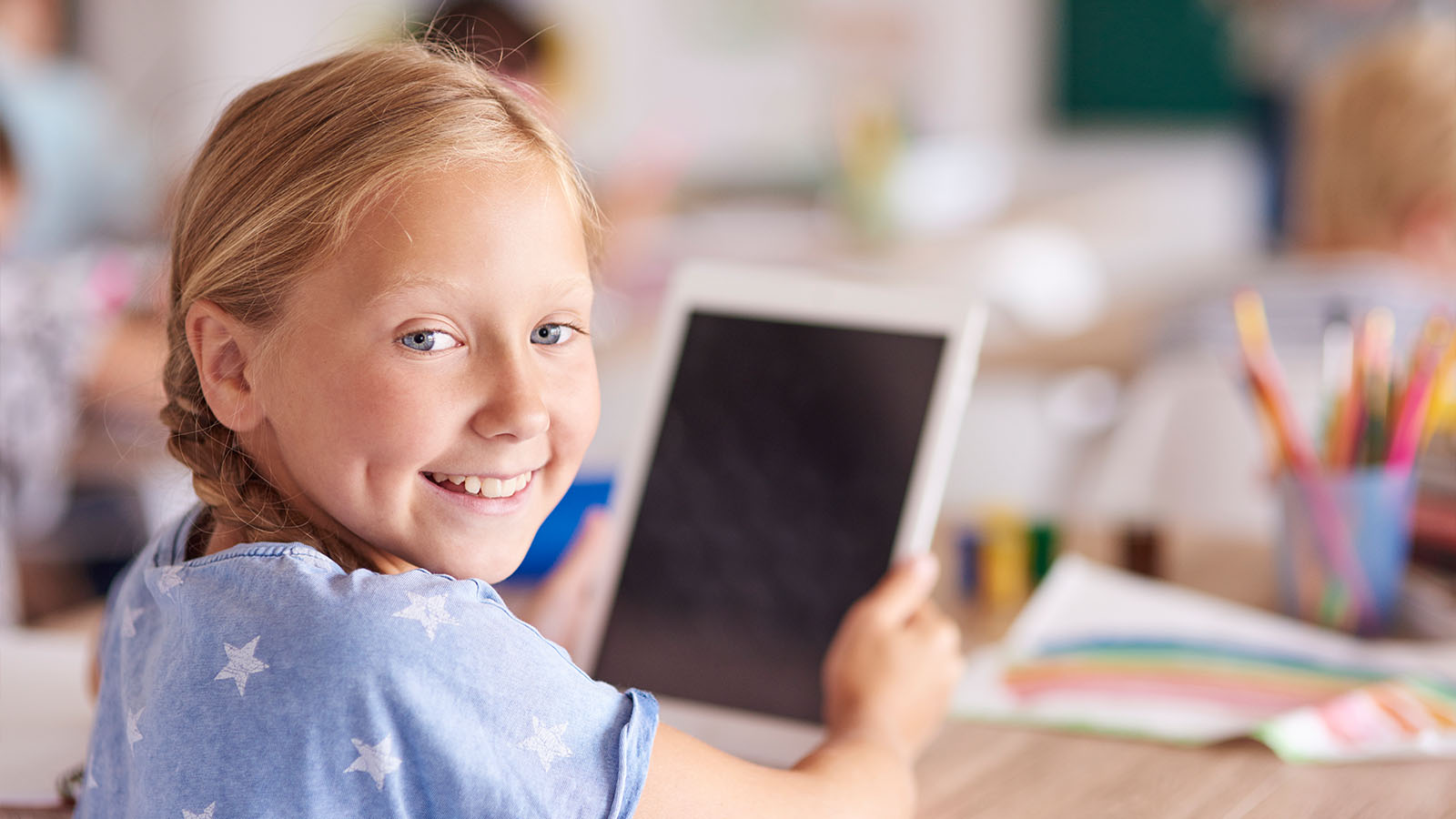 iPad til børn med farverigt lærings- og familievenligt setup
